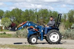 Student learning to use the tractor