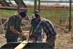 Mentors and Students building a new hay barn and tack room on Kingfisher Ranch property