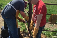 Students practicing his welding skills with mentor