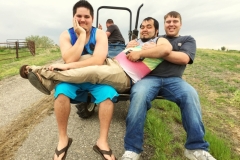 Students taking a break on the tractor