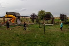 Students and staff enjoying an intense game of badminton